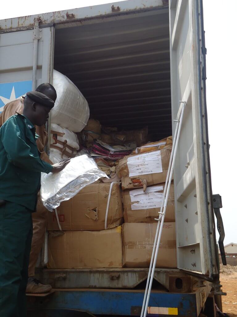 Manual goods inspection at the Nimule OSBP, SouthSudan