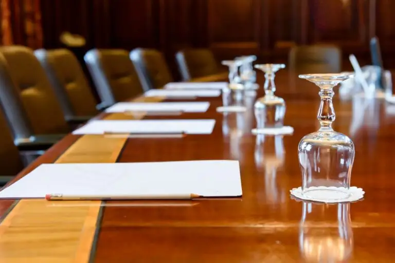 Large,Wooden,Table,In,A,Board,Room,With,Wood,Panelling,