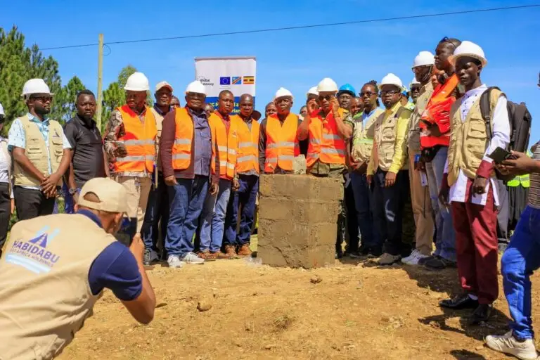 Partners gather at the foundation stone of the new EU-funded bridge at Mahagi-Goli